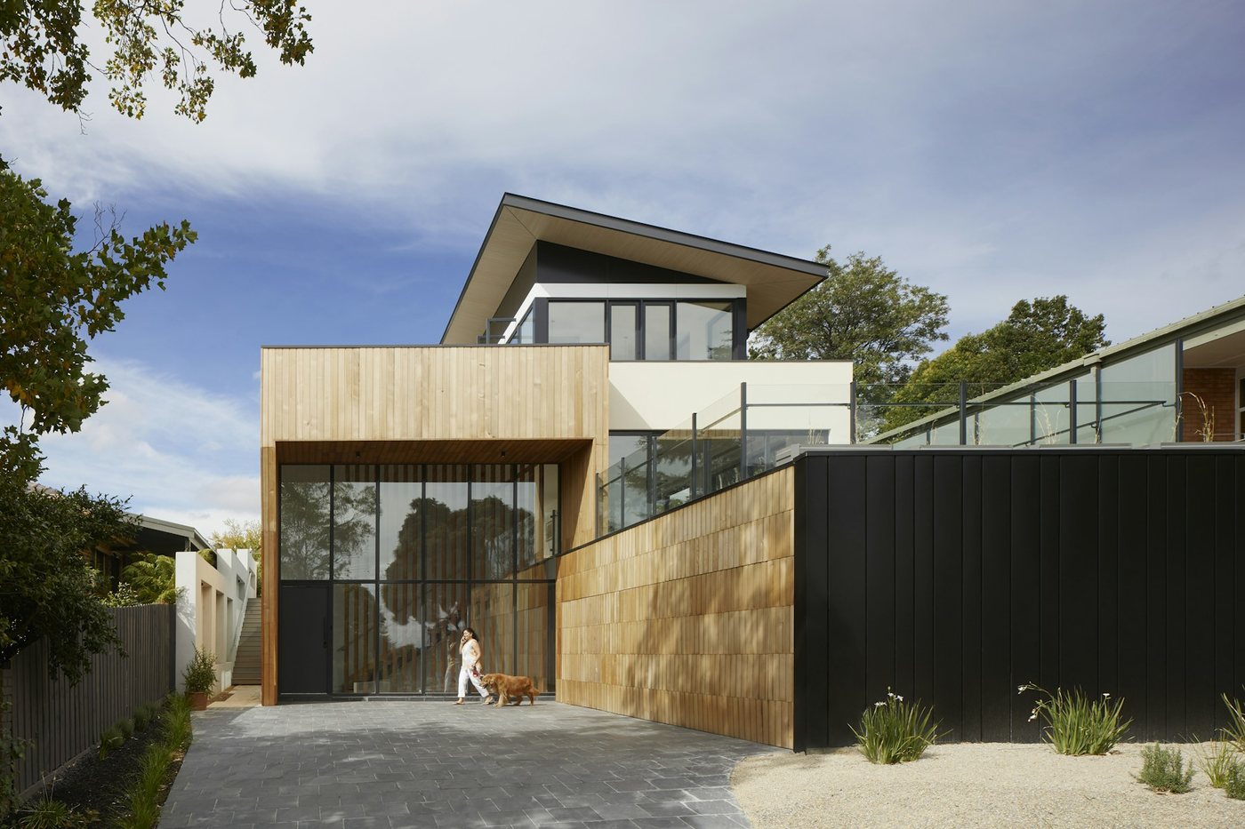 Modern second-storey addition with large windows